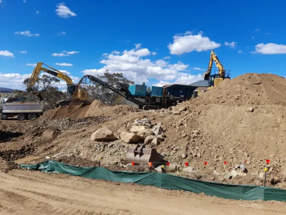 Site photo with excavator.