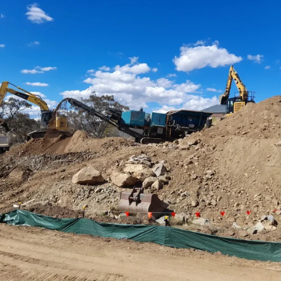 Site photo with excavator.